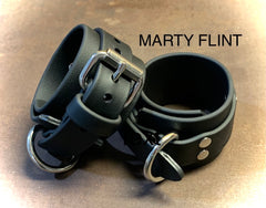 Black biothane wrist bondage restraints 